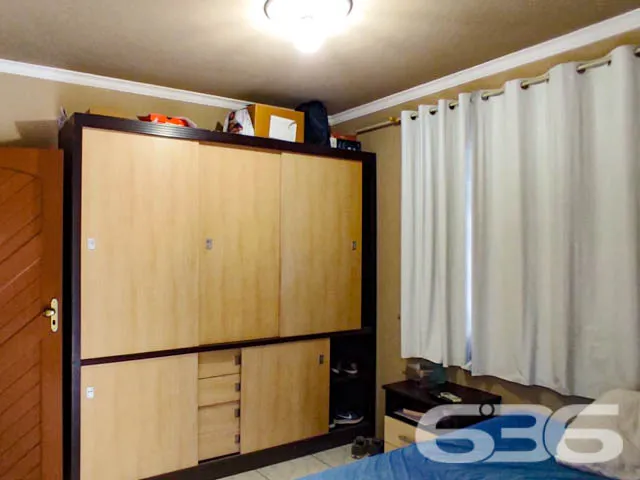 DUAS CASAS SOB UM AMPLO TERRENO NO BAIRRO ANITA GA