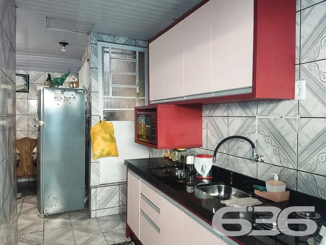 IMÓVEL COM 3 QUARTOS EM ÓTIMA LOCALIZAÇÃO NO BAIRR